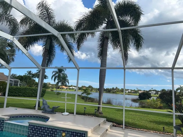 a view of a golf course with a lake