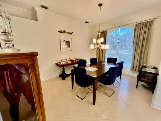 a view of a livingroom with furniture and window