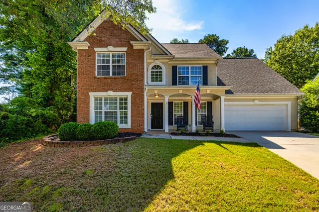 a view of a house with a swimming pool