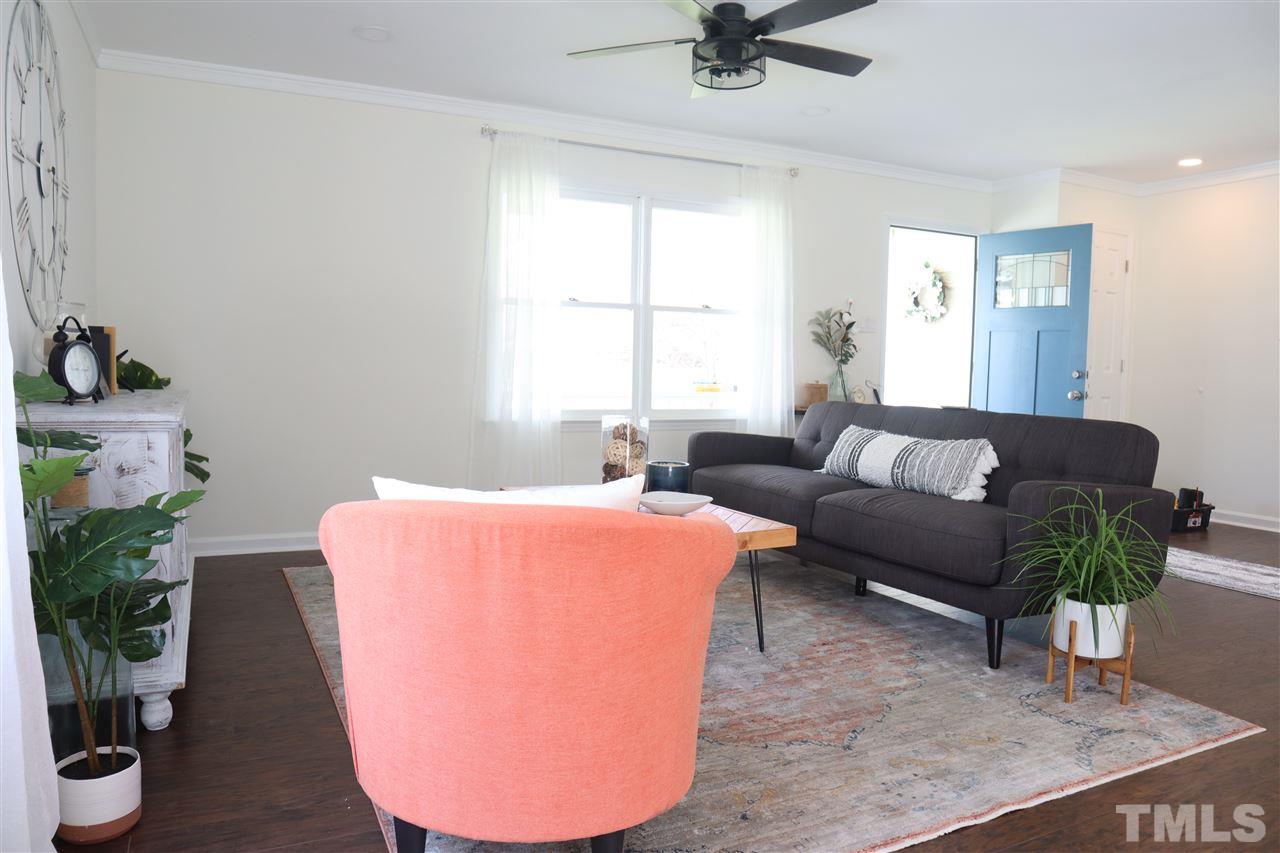 7009 Kiger Road Rougemont, NC 27572 - Photo 12 of 25 a living room with furniture and a window