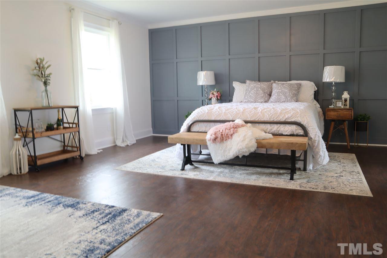 7009 Kiger Road Rougemont, NC 27572 - Photo 15 of 25 a bedroom with a bed and a window