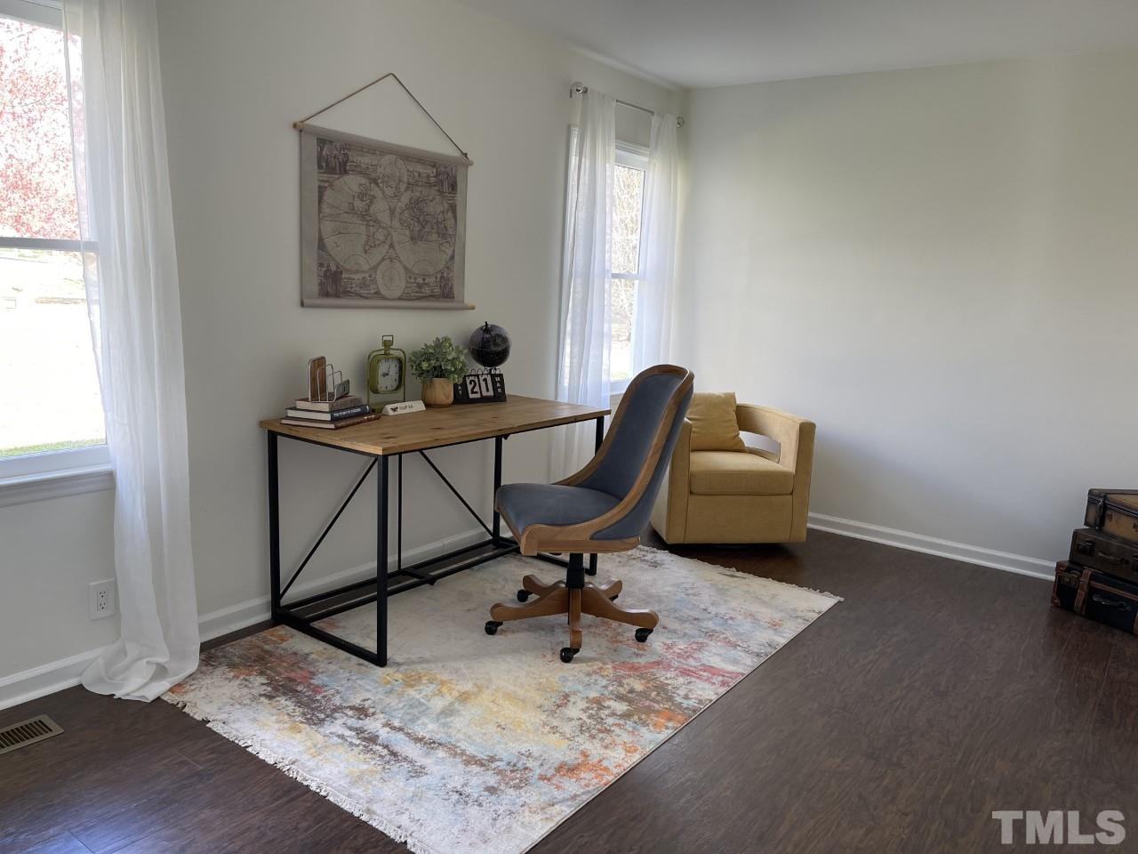 7009 Kiger Road Rougemont, NC 27572 - Photo 23 of 25 a view of a workspace with furniture and a window