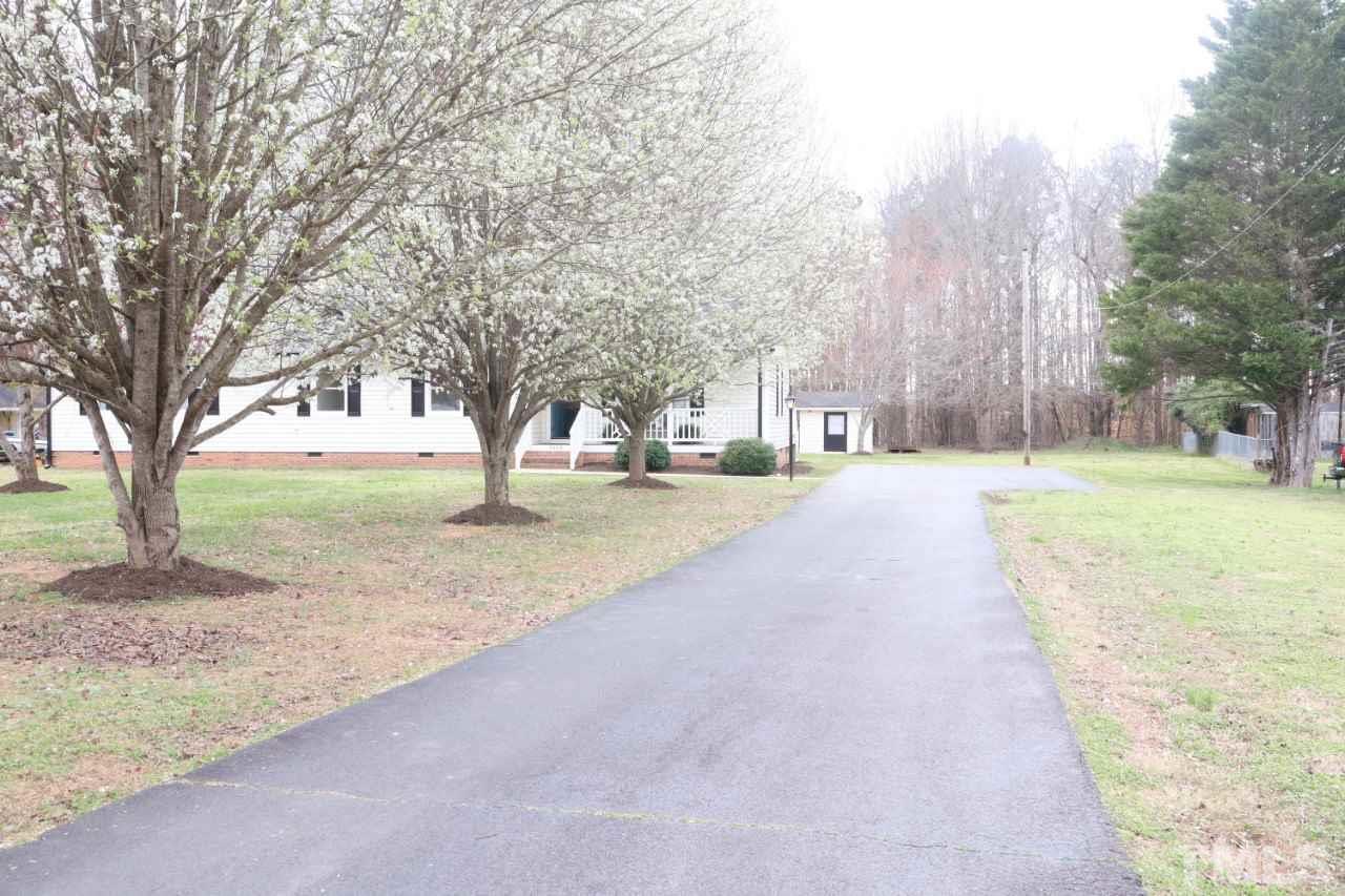 7009 Kiger Road Rougemont, NC 27572 - Photo 5 of 25 a view of road with trees