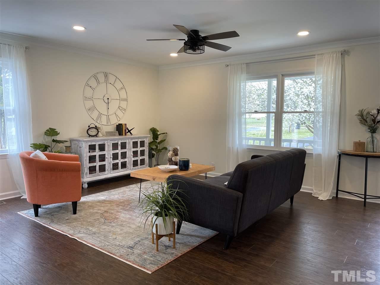 7009 Kiger Road Rougemont, NC 27572 - Photo 9 of 25 a living room with furniture and a window