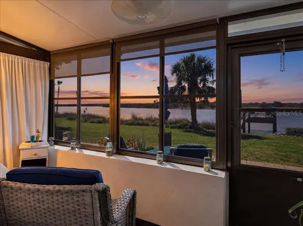 a room with balcony and furniture