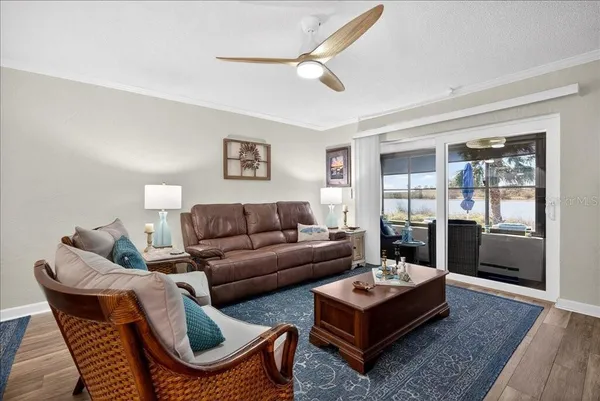a living room with furniture and a rug