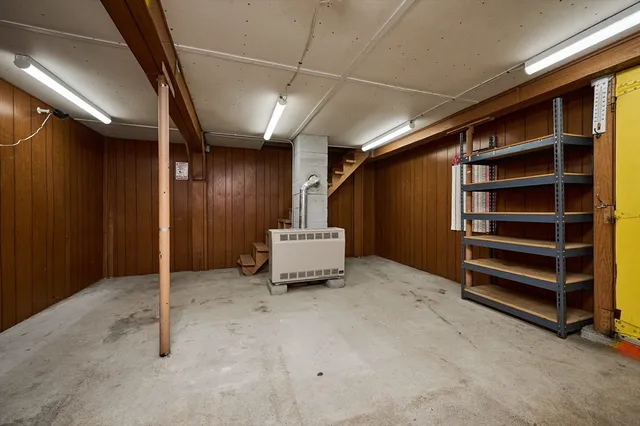 a view of an empty room with stairs