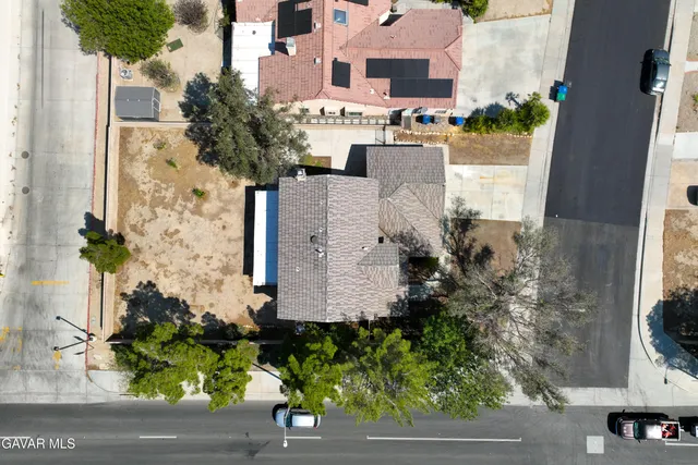 an aerial view of residential house with outdoor space