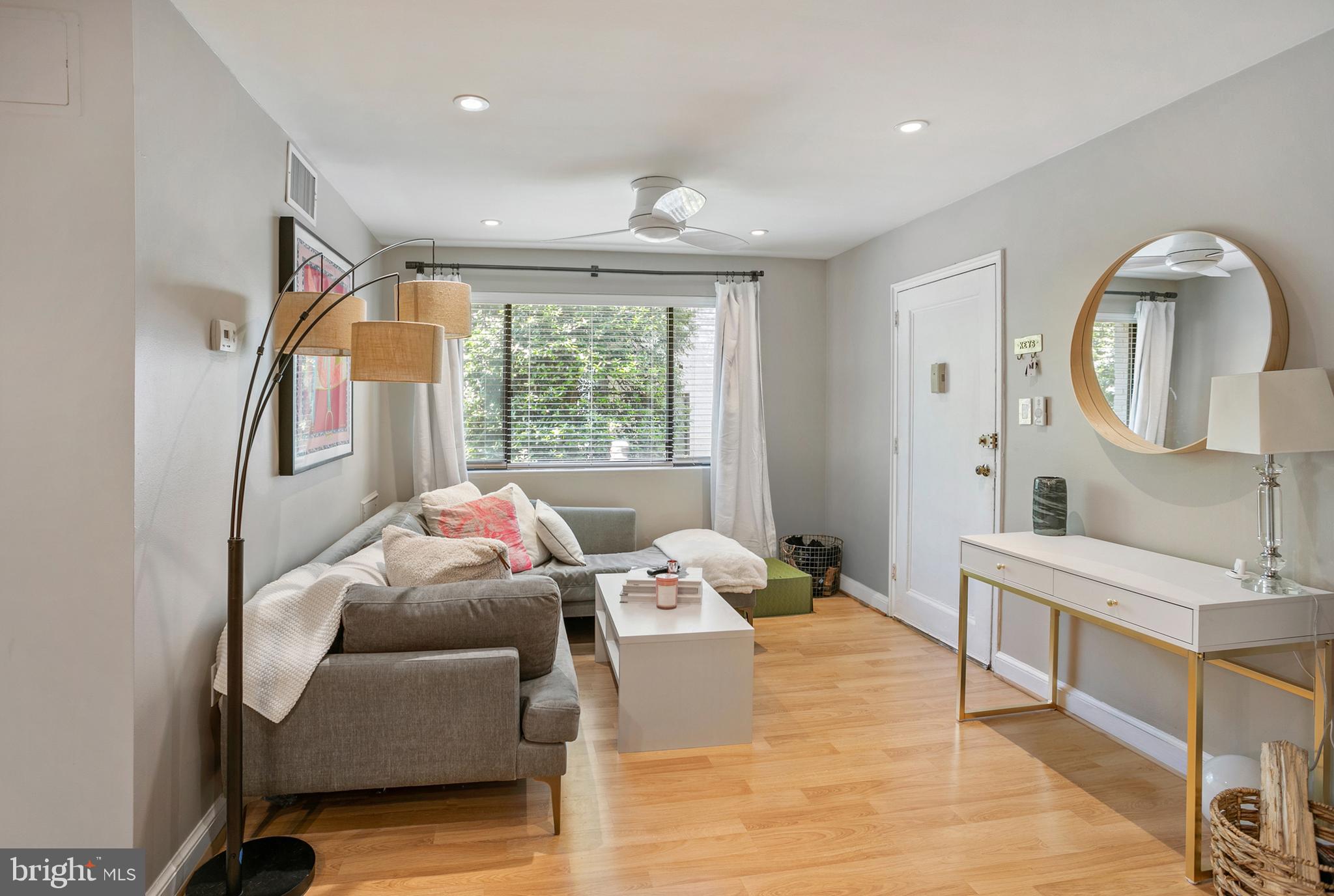 3817 Davis Place Northwest, Unit 2 Washington, DC 20007 - Photo 1 of 21 a living room with furniture and a large window
