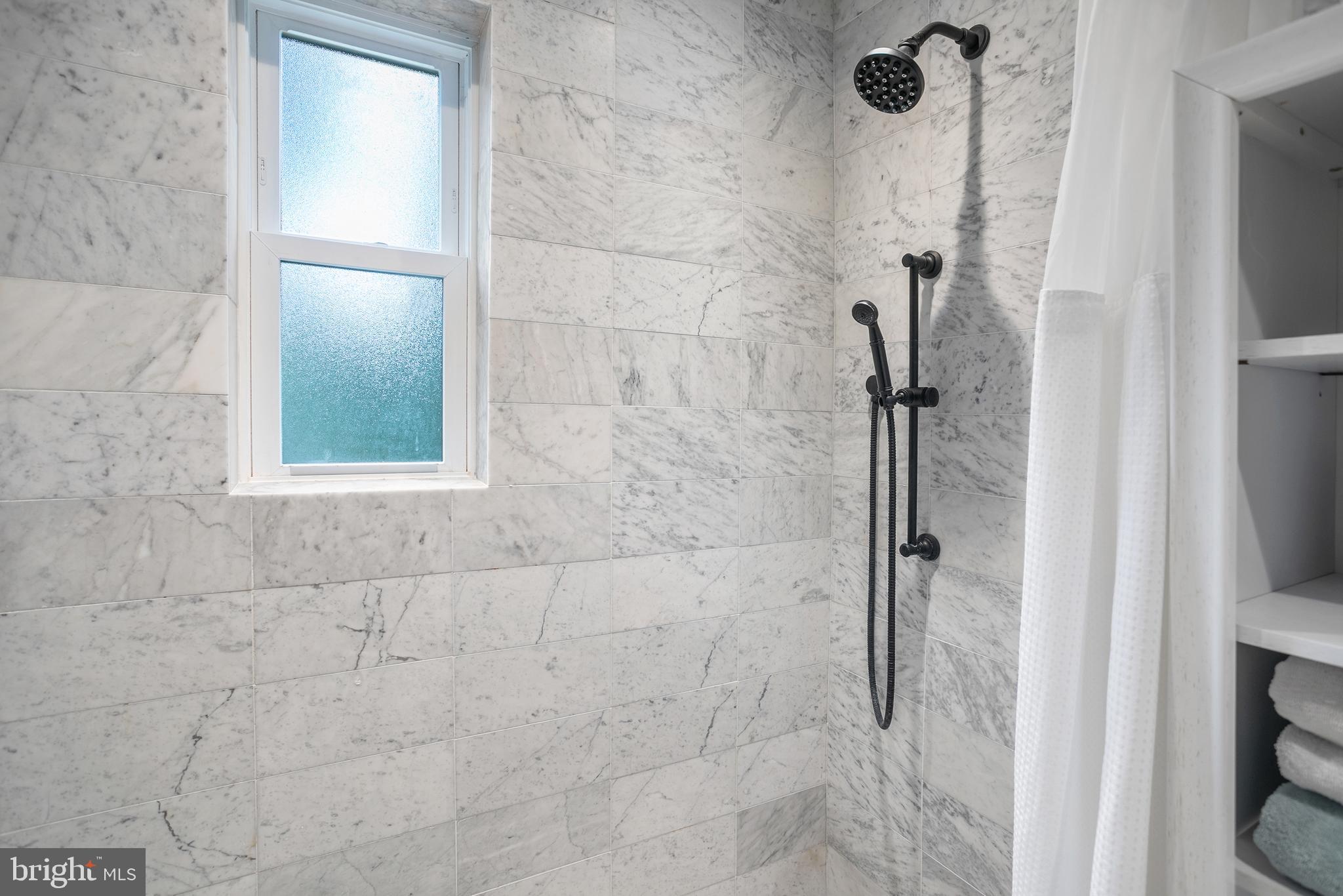 3817 Davis Place Northwest, Unit 2 Washington, DC 20007 - Photo 8 of 21 a bathroom with a shower