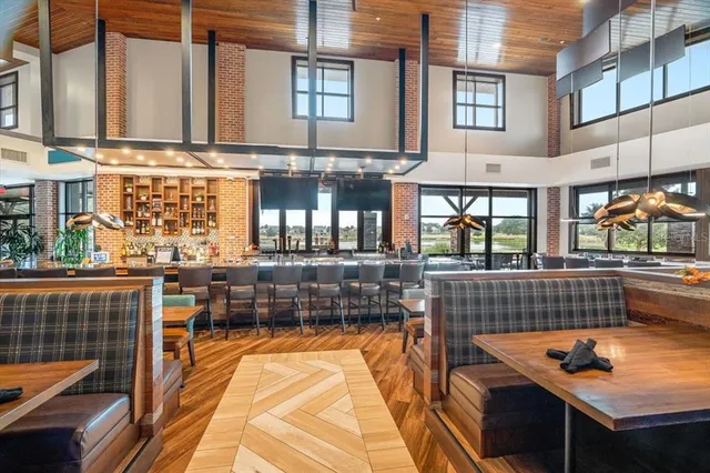 a view of swimming pool with a patio