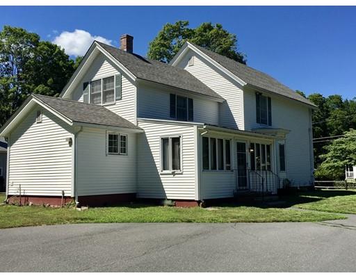 3 Maple Road Williamsburg, MA 01096 - Photo 3 of 28 a view of a white house with a yard and large trees