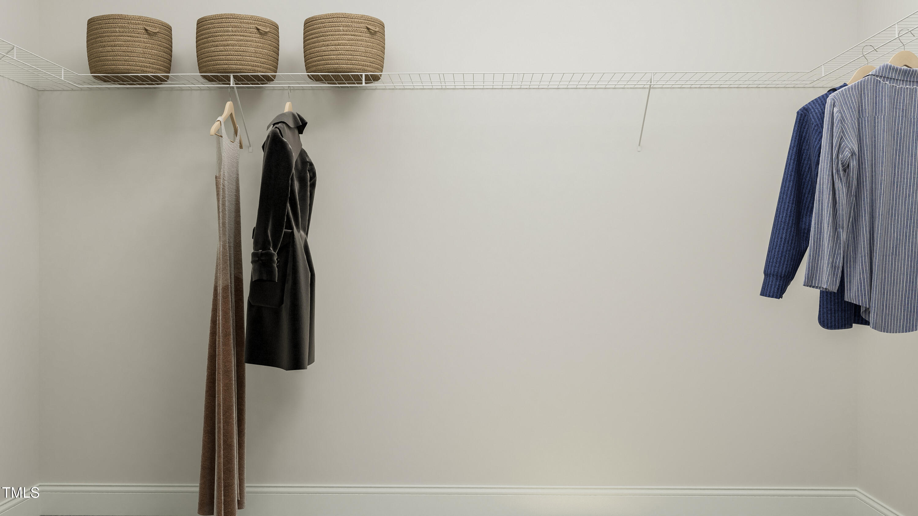 116 Corapeake Way Apex, NC 27539 - Photo 16 of 36 a close view of walk in closet with clothes