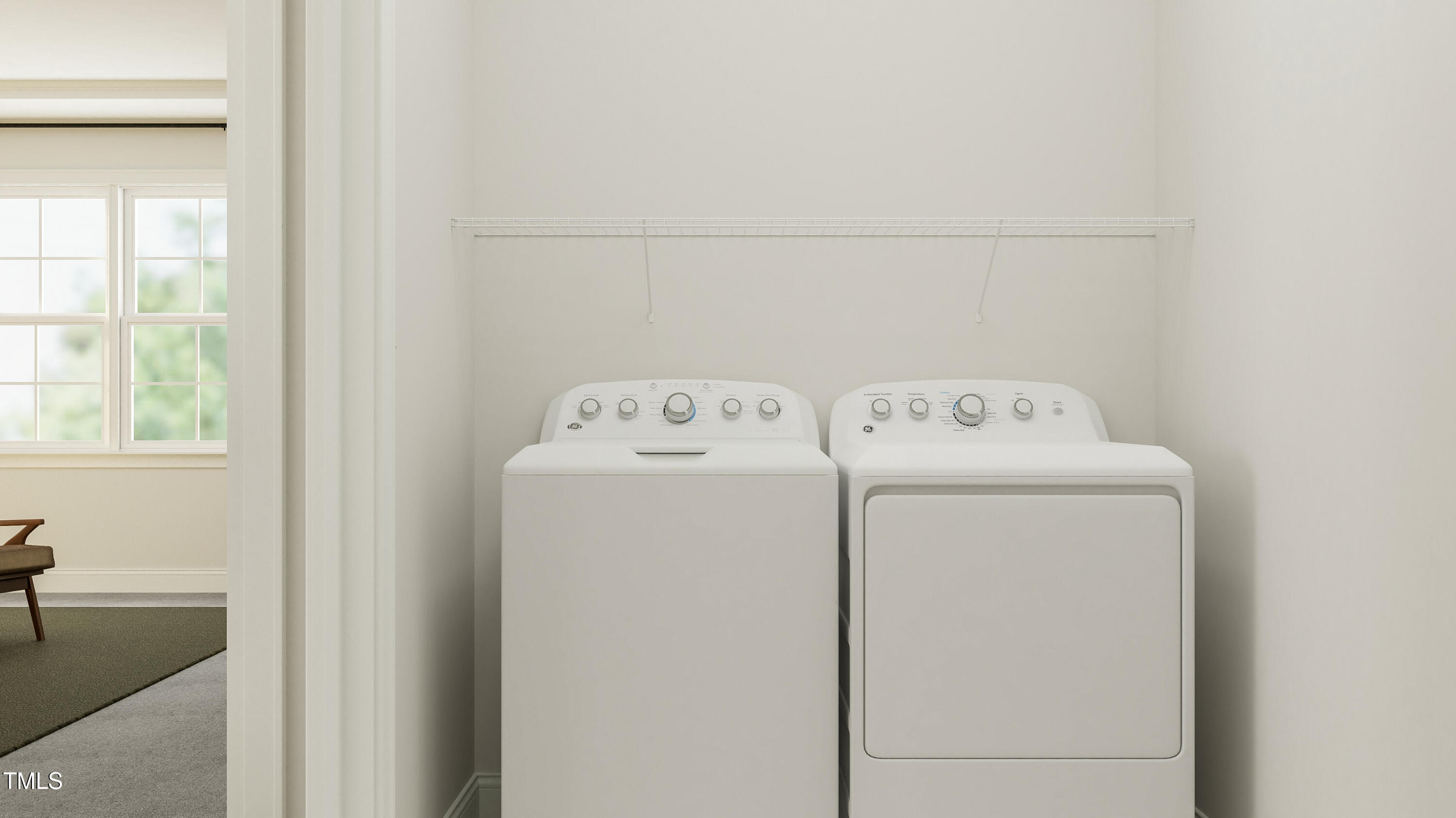 116 Corapeake Way Apex, NC 27539 - Photo 27 of 36 a utility room with dryer and washer