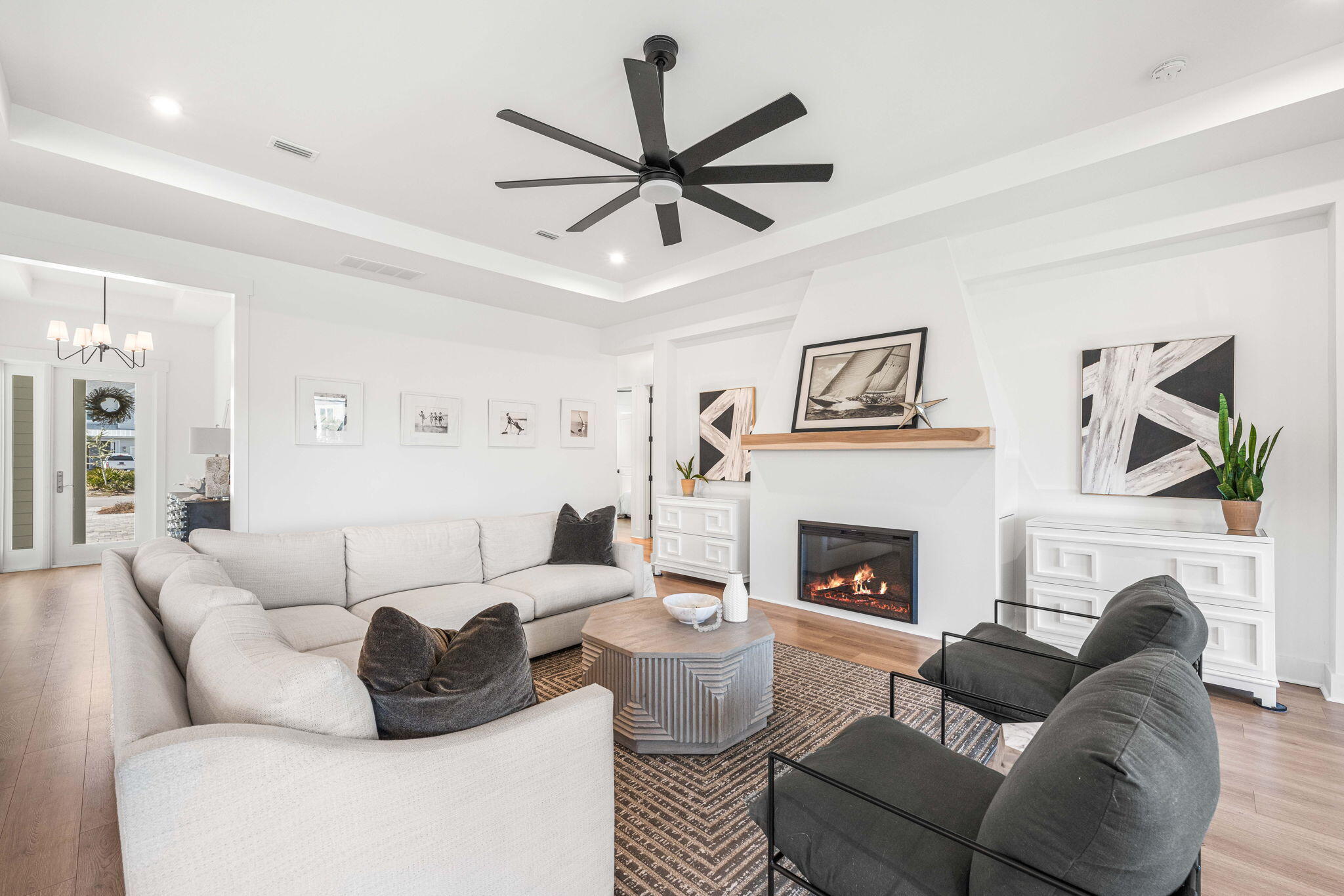 425 Lafayette Road Watersound, FL 32461 - Photo 13 of 47 a living room with furniture a fireplace