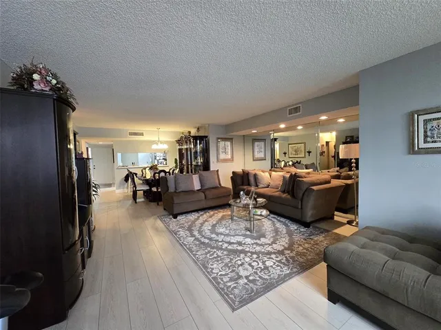 a living room with furniture and a couch