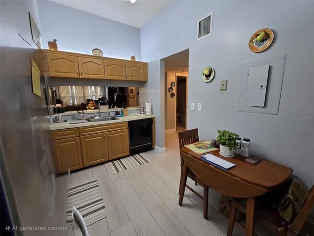 a kitchen with a sink cabinets and window
