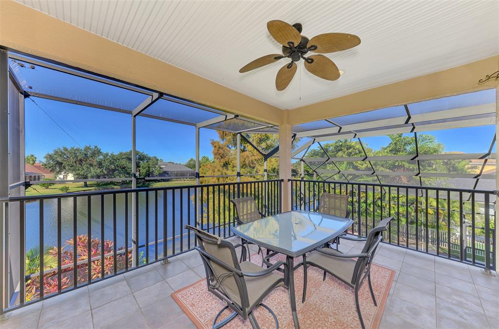 6610 Coopers Hawk Court Lakewood Ranch, FL 34202 - Photo 66 of 97 a view of a balcony with furniture