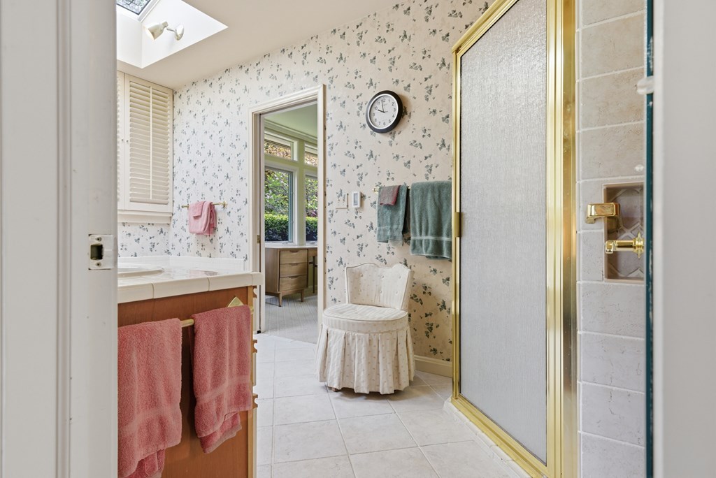 6203 Airport Road Andrews, NC 28901 - Photo 19 of 50 a bathroom with a sink a mirror and a shower