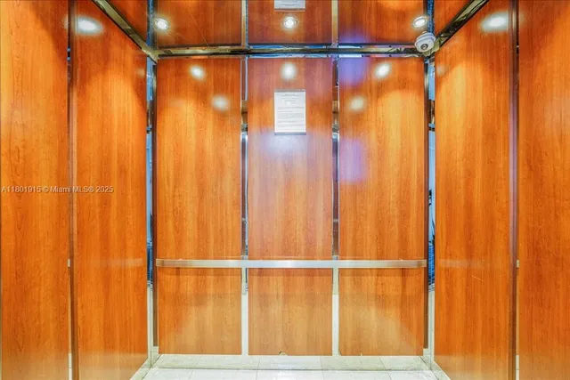 a bathroom with a sink and a washer dryer