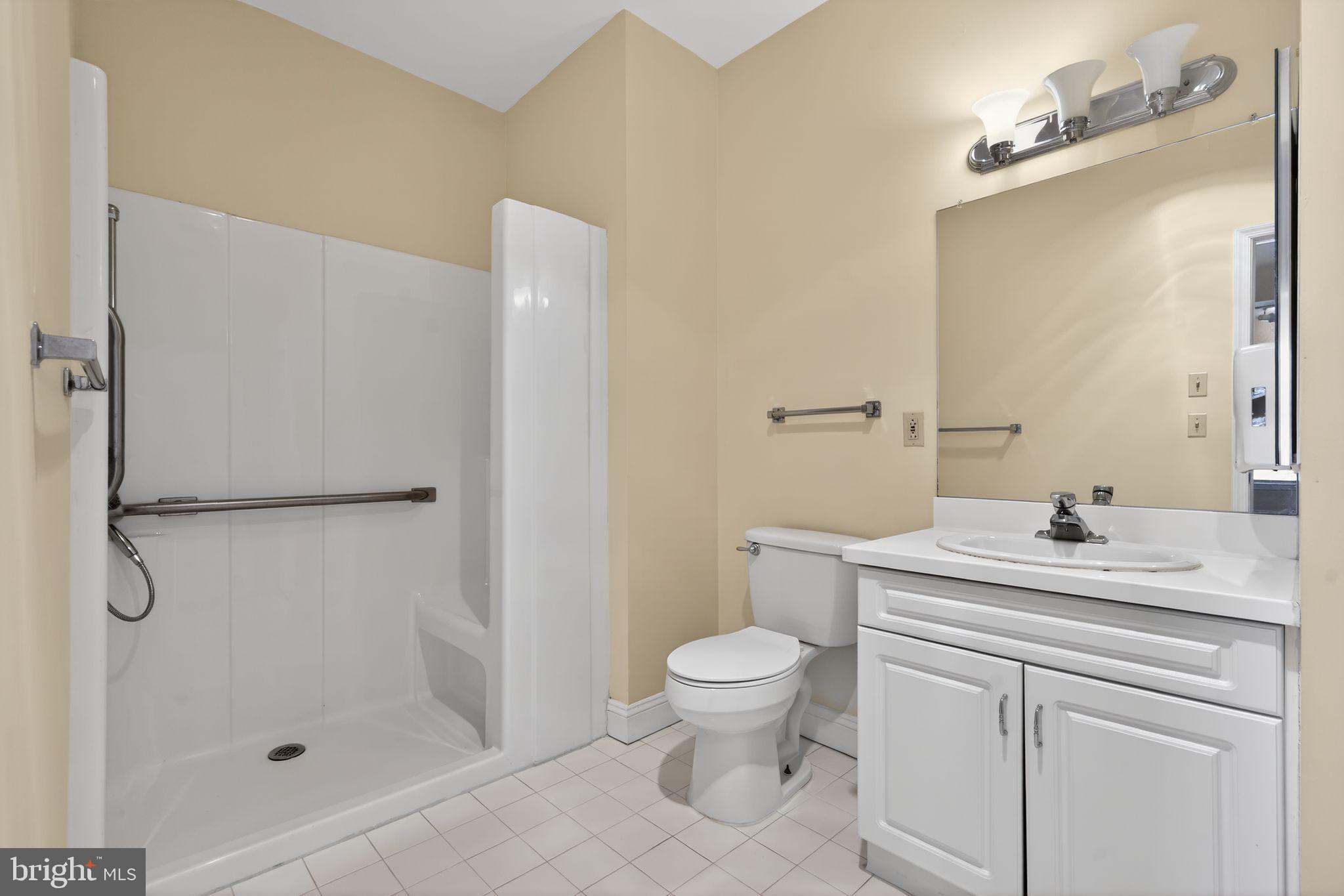 2006 Windrow Drive Princeton, NJ 08540 - Photo 19 of 23 a bathroom with a sink a toilet and shower