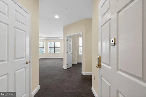 a view of entryway with bathroom
