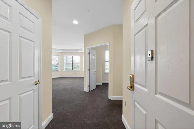 a view of entryway with bathroom