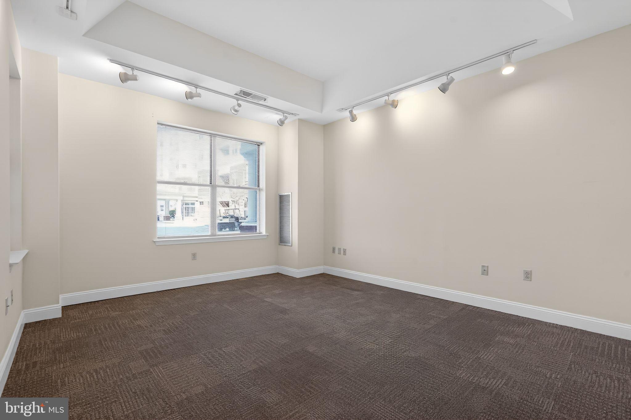 2006 Windrow Drive Princeton, NJ 08540 - Photo 4 of 23 a view of an empty room with a window