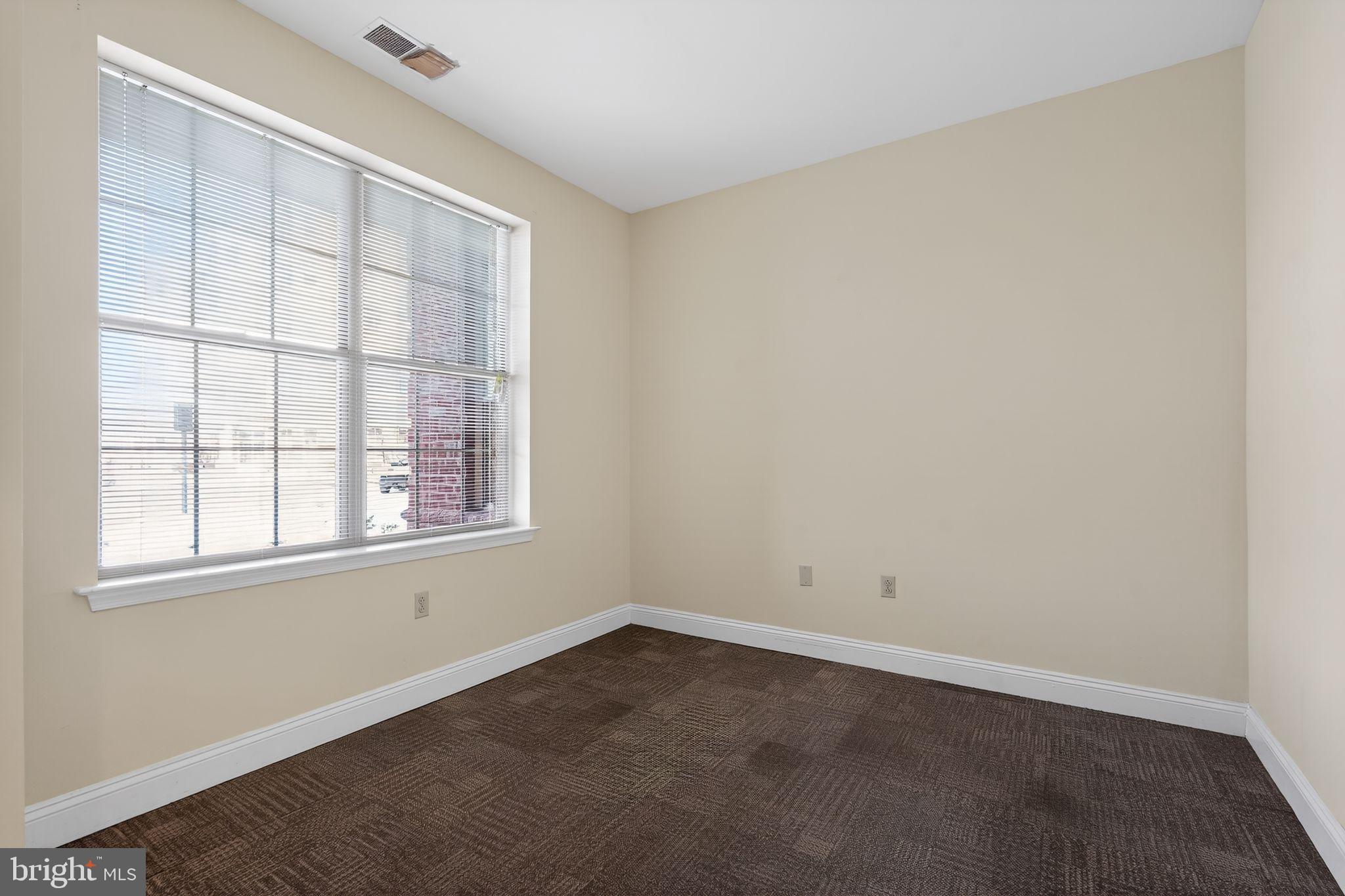 2006 Windrow Drive Princeton, NJ 08540 - Photo 5 of 23 an empty room with a window