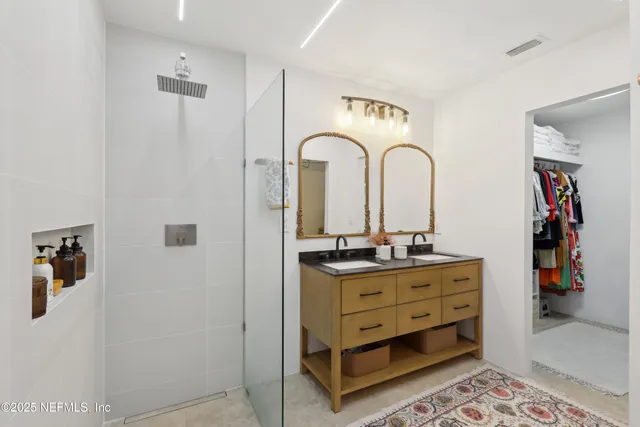 a view of room with cabinets and wooden floor