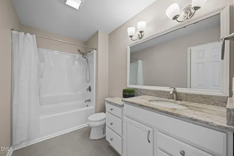 a view of a balcony with wooden floor