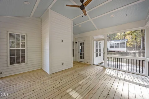 a view of house with backyard of the house