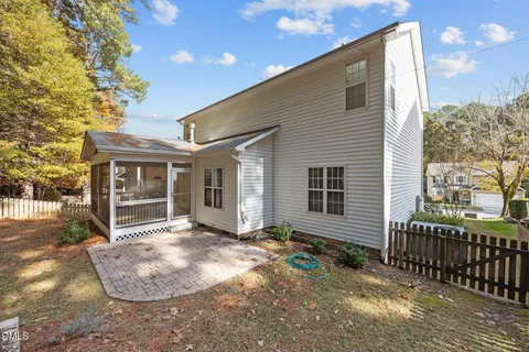 a view of a park with large trees