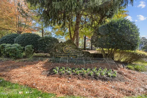 an aerial view of house with yard swimming pool and outdoor seating