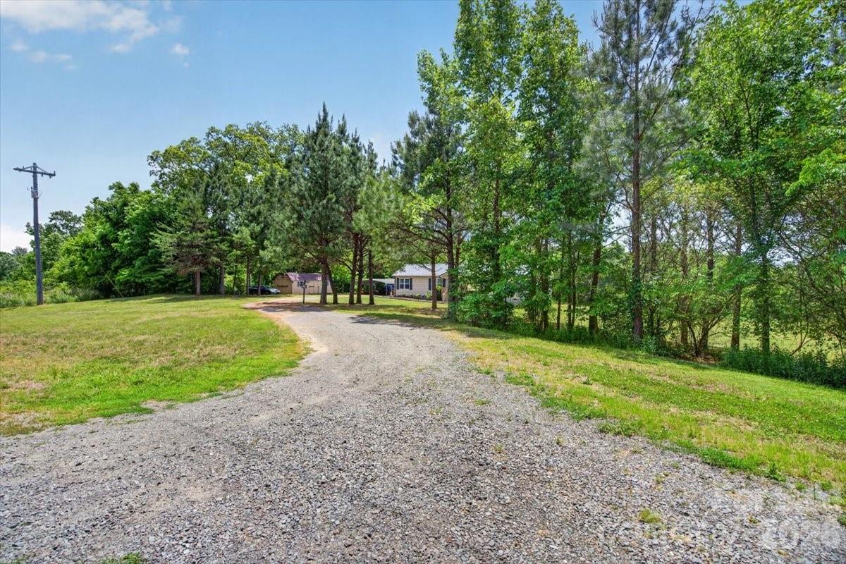 567 Godbey Road Mocksville, NC 27028 - Photo 29 of 38 a view of a park with large trees