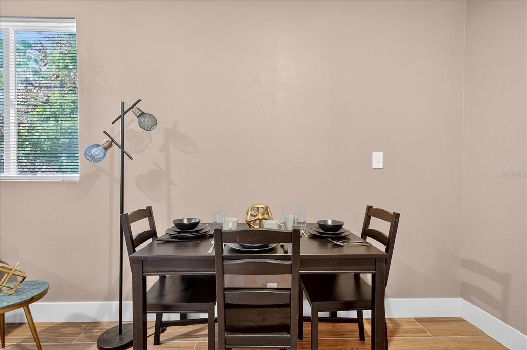 917 Mack Avenue, Unit 2 Orlando, FL 32805 - Photo 8 of 19 a view of a workspace with furniture