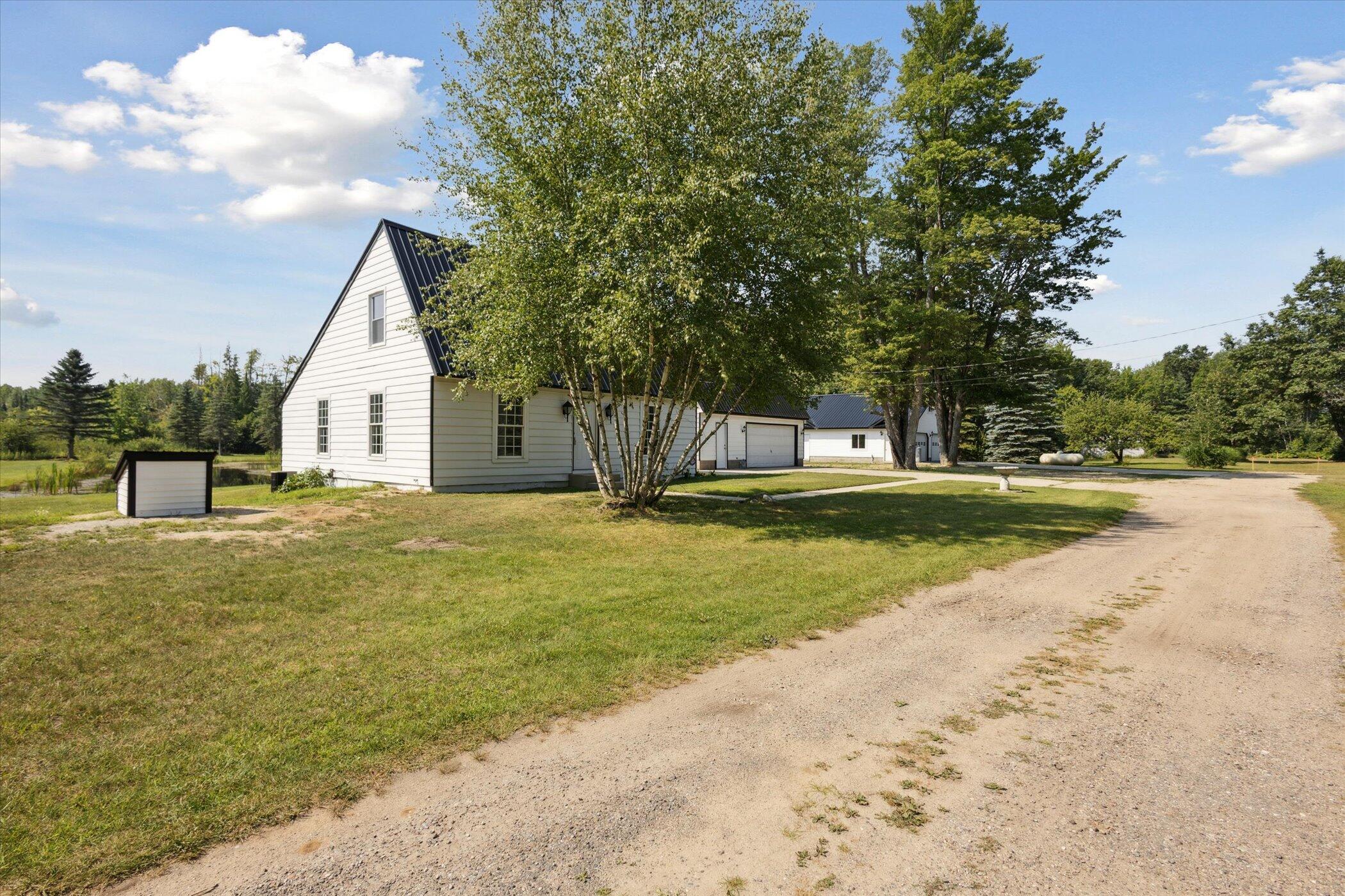 3441 Townline Road Houghton Lake, MI 48629 - Photo 31 of 53 Exterior Side