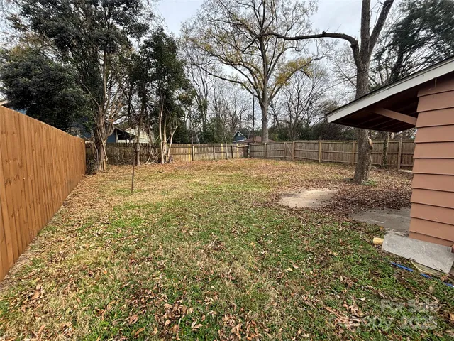 a view of backyard with tree