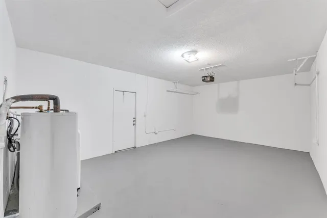 a view of a room that has a large window