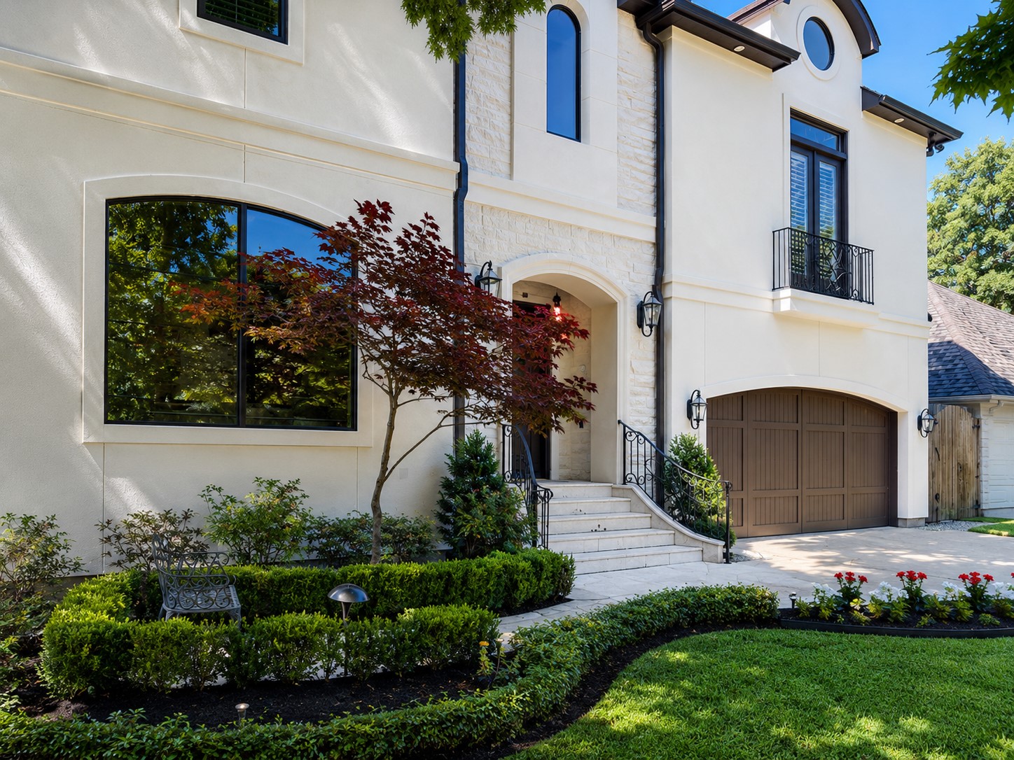 4511 Merrie Lane Bellaire, TX 77401 - Photo 46 of 46 Classic Bellaire facade with balanced design and manicured landscaping