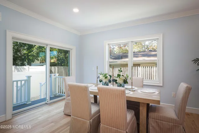 a kitchen with a table and chairs in it