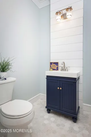 a bedroom with a large bed and a large window