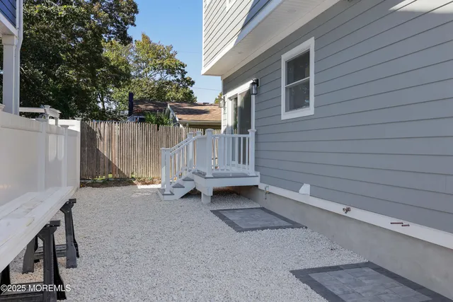 an aerial view of a house with a garden