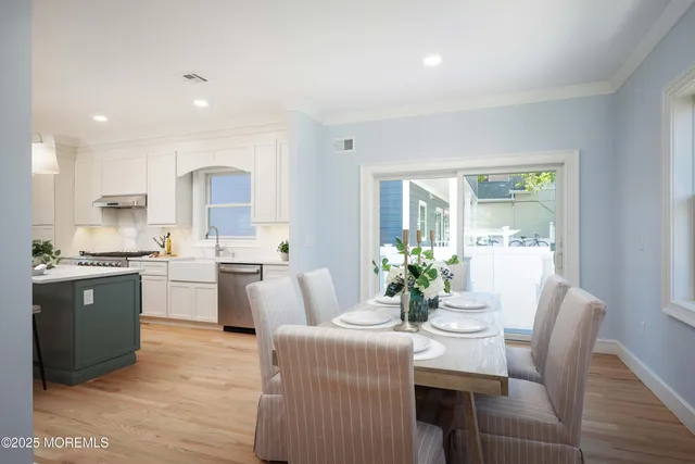 a dining room with furniture window wooden floor