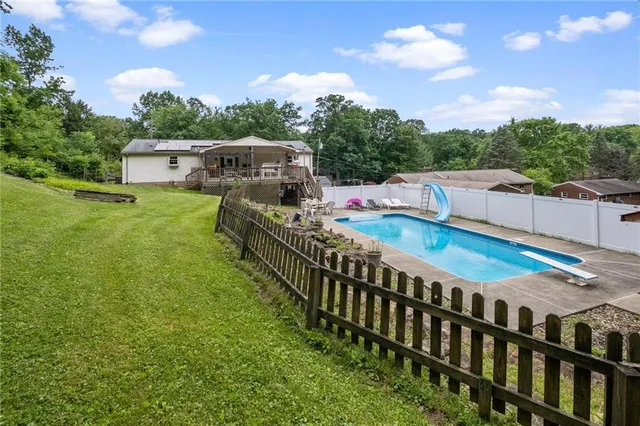 a view of a balcony with wooden floor