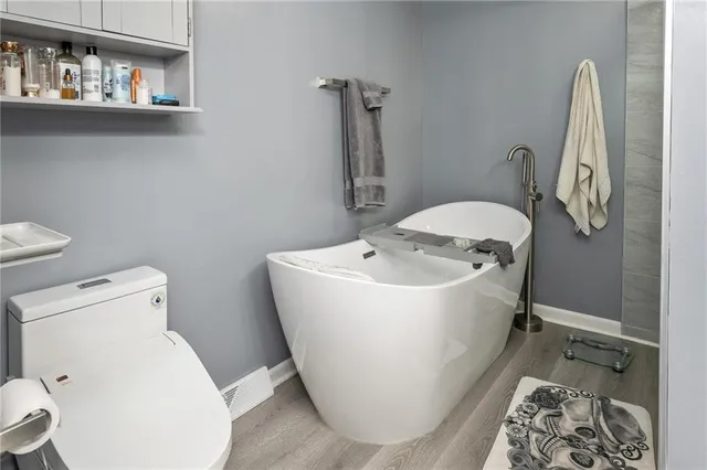 a bathroom with a sink and toilet