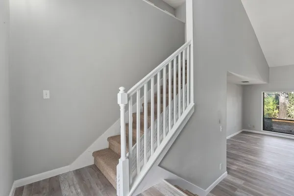 a view of entryway with wooden floor