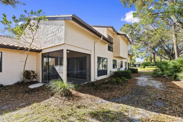 a view of a small white house