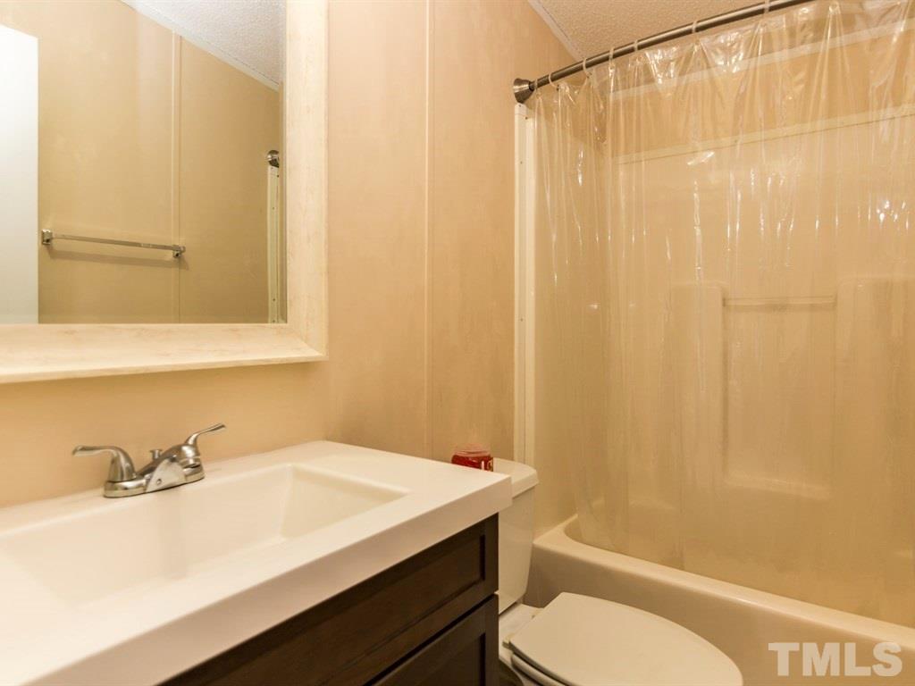 4889 Thom Road Mebane, NC 27302 - Photo 13 of 21 Hall Bathroom