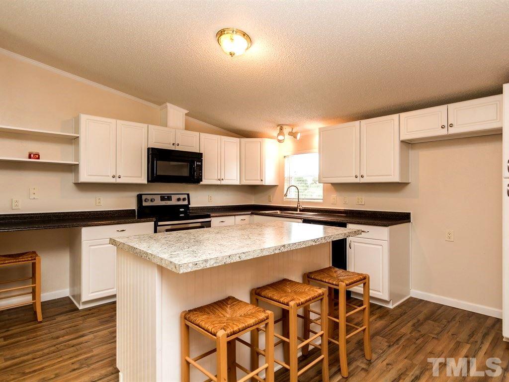 4889 Thom Road Mebane, NC 27302 - Photo 5 of 21 Island Bar in the Kitchen